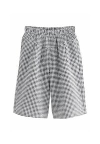 Pantaloni a quadri bianchi e neri in gingham con vita elastica, caratterizzati da pieghe per un volume aggiuntivo e una vestibilità rilassata.
