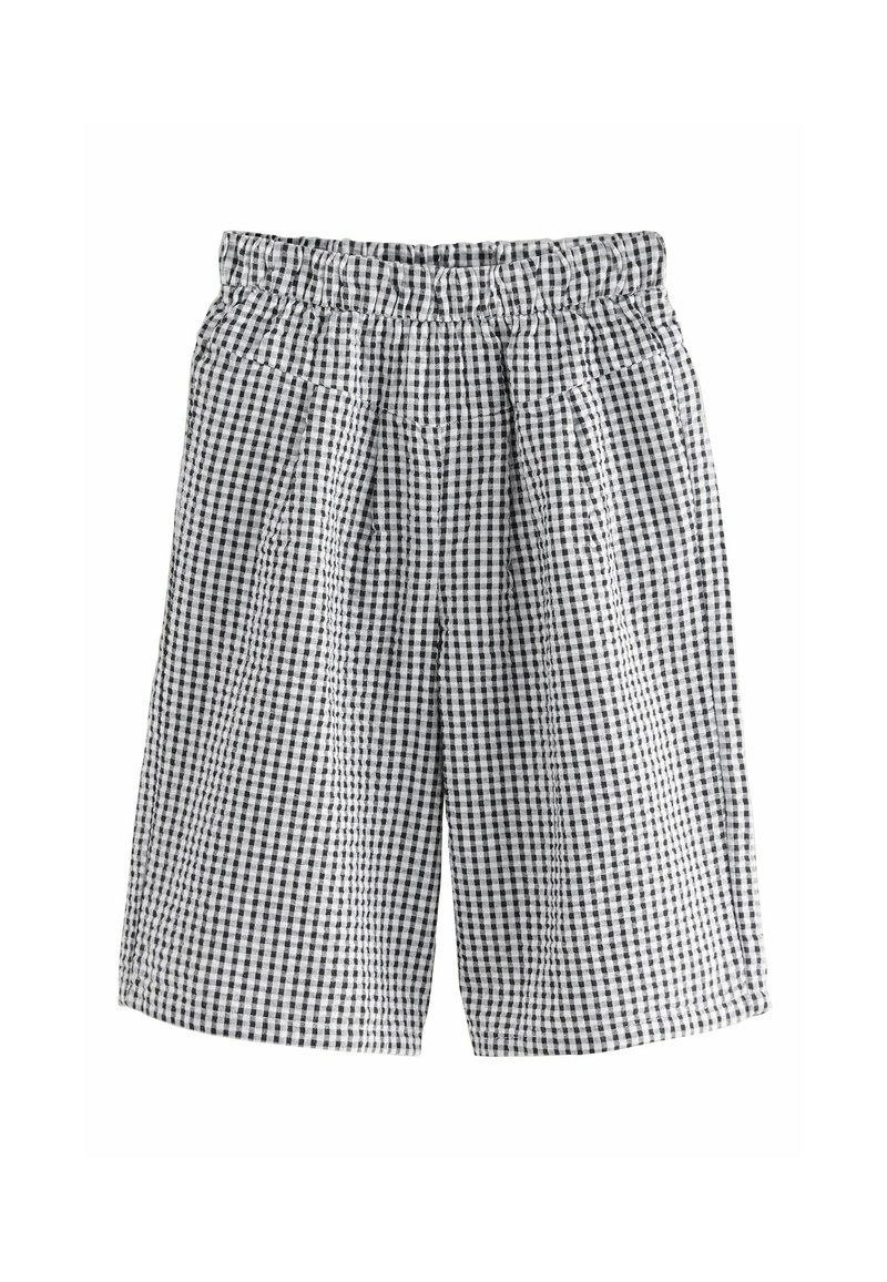 Pantaloni a quadri bianchi e neri in gingham con vita elastica, caratterizzati da pieghe per un volume aggiuntivo e una vestibilità rilassata.