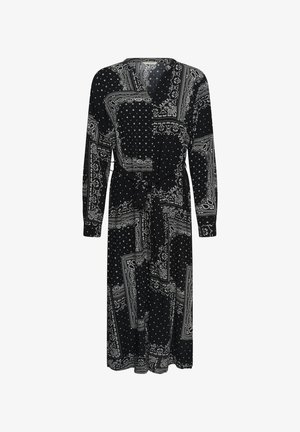 Vestito midi nero a maniche lunghe con stampe patchwork bianche a paisley e pois, scollo a V e cintura in vita.