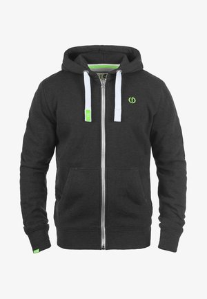 Temno siva zip-hoodica iz mešanice bombaža, z belimi vrvicami, zelenimi detajli in stranskimi žepi. Gladka tekstura z rebrastimi manšetami.