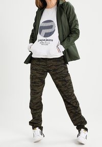 Carhartt WIP Kapsáče - dark green