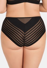 Chiloți negri cu talie înaltă, având un design transparent cu dungi, cu un panou solid negru în spate și un accent în formă de V în centru.