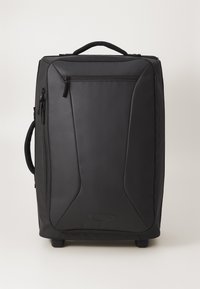 Rolling black luggage with a smooth synthetic exterior, zippered pockets, a top handle, and wheels for mobility. Features a sleek, angled design.