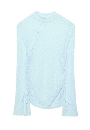Light blue lace long-sleeve top with high collar, side and sleeve tie details, and a textured floral pattern throughout.