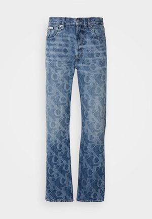 Džínové kalhoty světle modré barvy s tónovým abstraktním vzorem. Mají rovný střih, pět kapes a kovové doplňky.