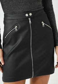 Next COATED ZIP - A-linjainen hame - black