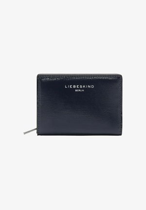 Granatowy skórzany portfel o eleganckiej, fakturowanej powierzchni. Na przedniej stronie srebrne logo „LIEBESKIND BERLIN” oraz zamek błyskawiczny na całym obwodzie.