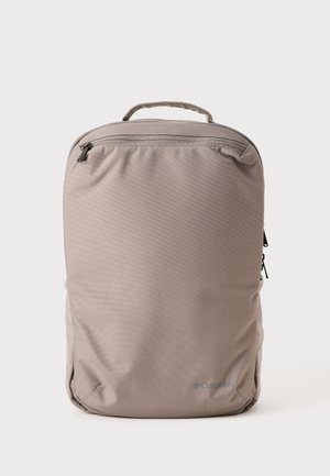 Gray fabric backpack with a zippered main compartment, top handle, and side pockets. Textured surface, minimalist design, and logo detail.