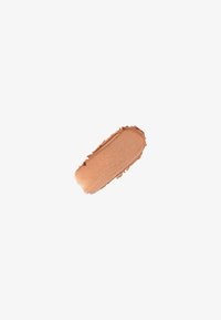 Traccia di fondotinta liquido con una consistenza liscia e cremosa in una tonalità beige medio caldo, con leggeri riflessi e un'applicazione morbida e uniforme.