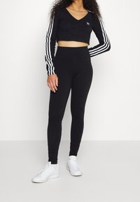 adidas Originals Tunn jacka - black