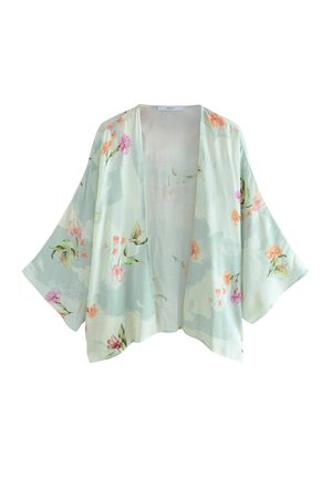 Hellgrünes, blumiges Kimono-Jäckchen mit großen Ärmeln, lockerer Passform und zarten rosa und gelben Blumenmustern auf einem weichen Stoff.