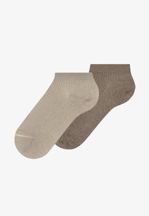 Two pairs of ribbed ankle socks, one beige and one brown, shown side by side on a white background.