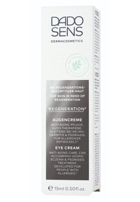 Augencreme-Verpackung, rechteckige Form, weiße Oberfläche mit grauen Akzenten. Text hebt Anti-Aging-Eigenschaften und die Hautverträglichkeit für empfindliche Haut hervor.