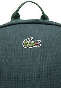 Lacoste PENCIL CASE UNISEX - Šolska torba - sinople