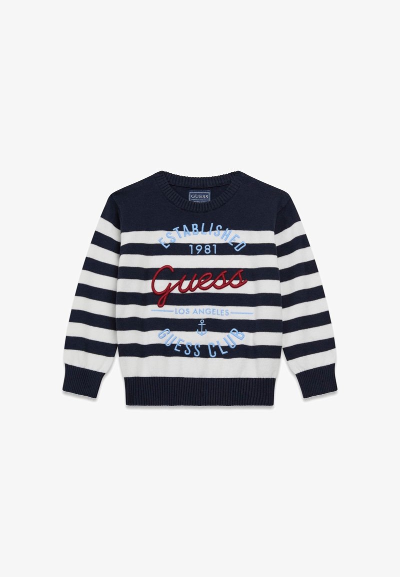 Pull en maille rayé bleu marine et blanc avec un col ras du cou côtelé. Comprend le logo "Guess" et un design textuel en broderie rouge et bleu clair.