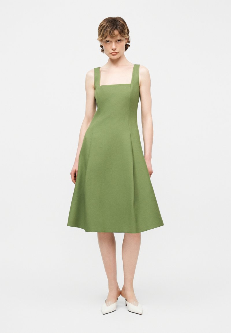 midi olive green dress Aelia Ruched Hardware Detail Cut-Out Midaxi Dress in Olive Green main image 1