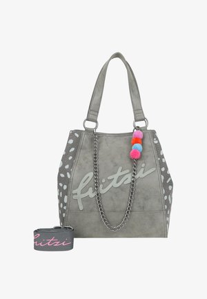 Sac à main gris avec une texture douce, doté d'une bandoulière en chaîne et de pompons colorés. Agrémenté de pois blancs et du logo "fitzi".