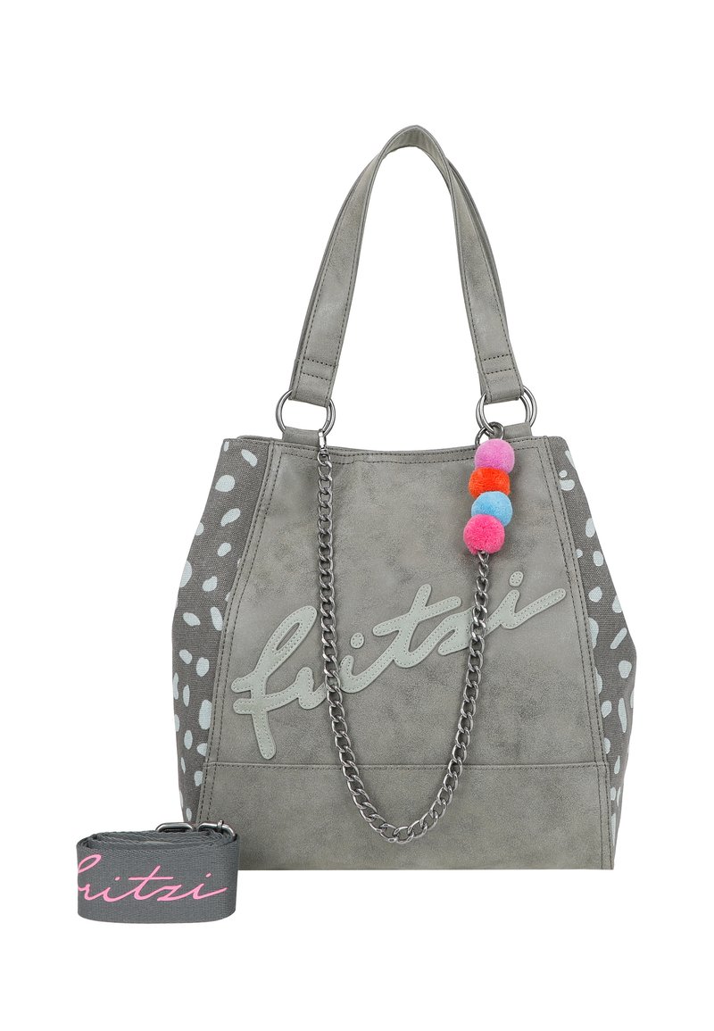 Sac à main gris avec une texture douce, doté d'une bandoulière en chaîne et de pompons colorés. Agrémenté de pois blancs et du logo "fitzi".
