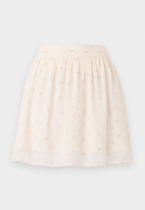 Ljusbeige kjol i genomskinlig tyg med en samlad midja. Har metalliska prickmönster över hela ytan.