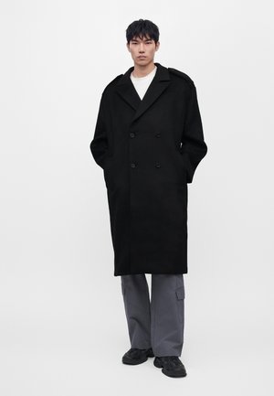Han Kjøbenhavn, DOUBLE BREASTED COAT UNISEX - Класическо палто - black