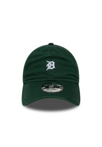 Grønn justerbar caps laget av bomull med en buet skjerm. Har hvit brodert logo på fronten og snapback-lukking.