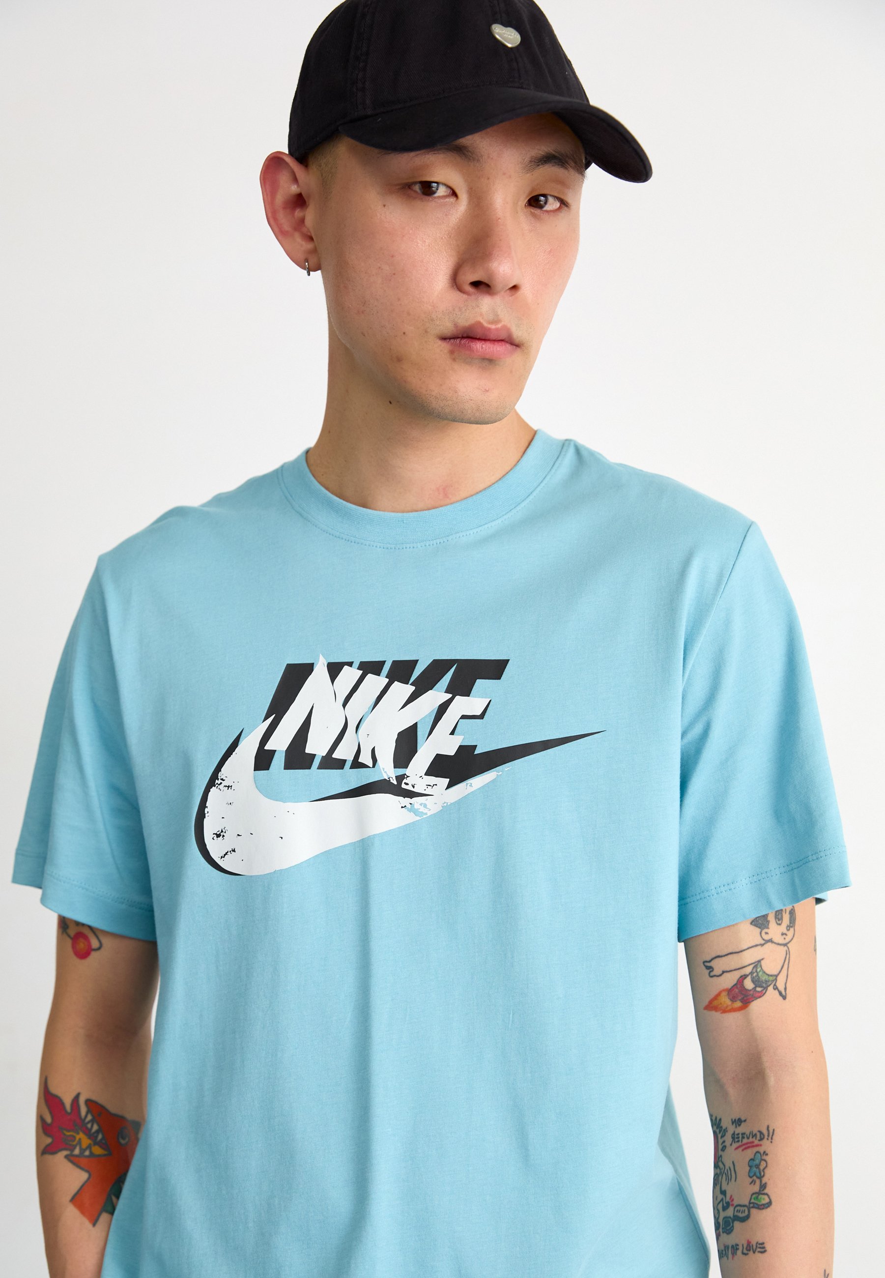 bright blue nike shirt