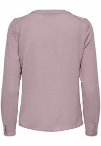 Maglietta a maniche lunghe in tessuto mauve chiaro, con finitura testurizzata, scollo rotondo e polsini con bottoni. Design posteriore semplice e pulito.