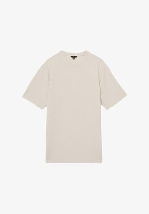 Světle béžové tričko s krátkým rukávem z žebrovaného materiálu, s kulatým výstřihem a rovně střiženým střihem. Jednoduchý design bez vzorů nebo akcentů.