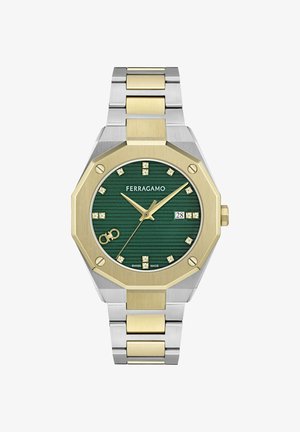 Divtoņu sudraba un zelta Ferragamo pulkstenis ar zaļu teksturētu ciparnīcu, zelta rādītājiem, dimanta stundu marķieriem, datuma logu un astoņstūrveida rāmi.