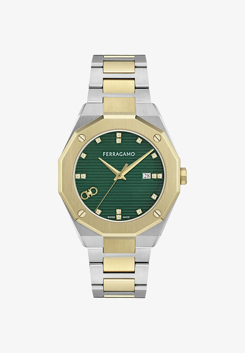 Kétszínű ezüst és arany Ferragamo karóra zöld, texturált számlappal, arany mutatókkal, gyémántórajelzésekkel, dátumablakkal és nyolcszögletű lünettával.