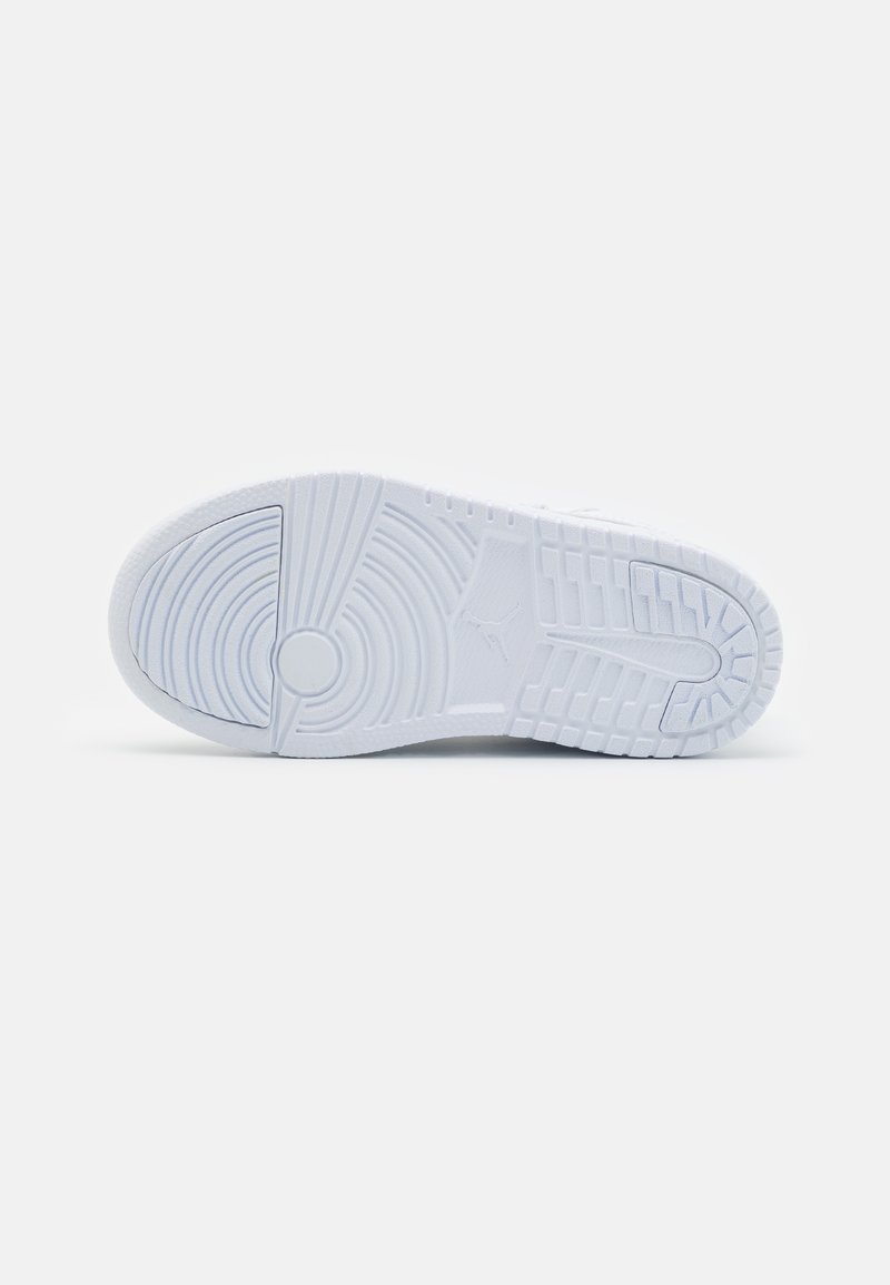 Suela de zapatilla blanca con patrones de dibujo circular, lineal y en cuadrícula visibles contra un fondo blanco liso.