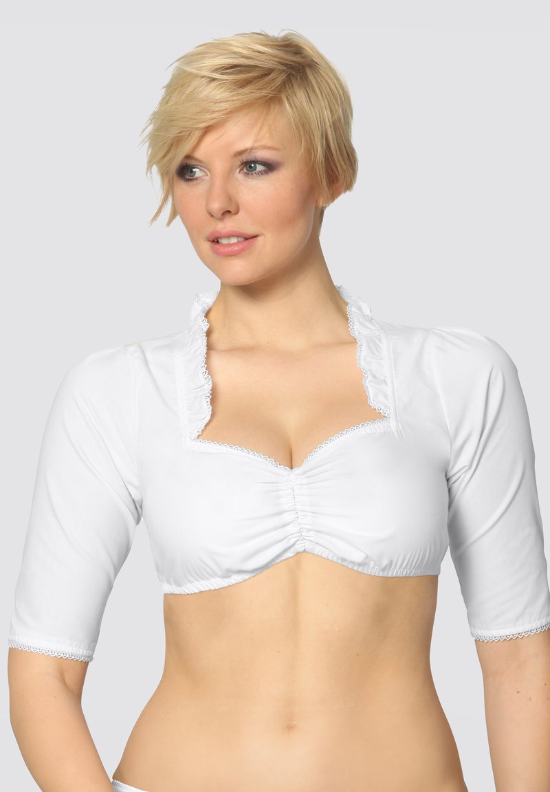 White cropped top with short sleeves. Features a gathered design at the bust and ruffled lace trim along the neckline and sleeves.