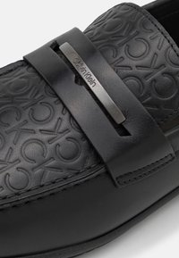 Calvin Klein Polobotky - black