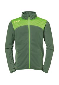 Groene jas met een contrasterend lichtgroen bovenstuk. Heeft een volledige ritssluiting, hoge kraag en een gladde stof met zijzakken.