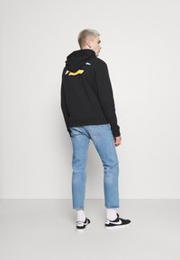 Levi's® 501® 93 CROP - Calças de ganga de perna direita - thunder night rider