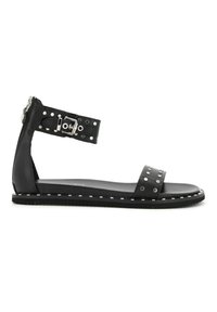 Sandalo nero con accenti di borchie, cinturino alla caviglia regolabile, suola piatta e design elegante. Realizzato in pelle con una texture liscia.