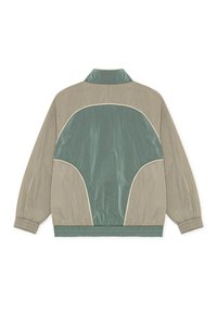 Veste légère beige et verte avec design en panneaux contrastés, poignets élastiques et col montant, vue de dos sur fond blanc.