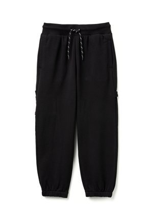 Schwarze Baumwoll-Jogginghosen mit elastischem Bund und Kordelzug, Seitentaschen und zulaufenden, gerippten Beinen. Glatte Textur und lässiges Design.