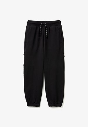 Black cotton joggers featuring an elastic waistband with drawstring, side pockets, and tapered cuffed legs. Smooth texture and casual design.