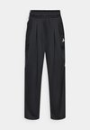 TIRO - Tracksuit bottoms - black
