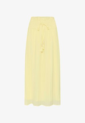 Világossárga, bokáig érő szoknya, összehúzott gumis derékrésszel és elöl két bojtos zsinórral, melyeken fa gyöngyök vannak.