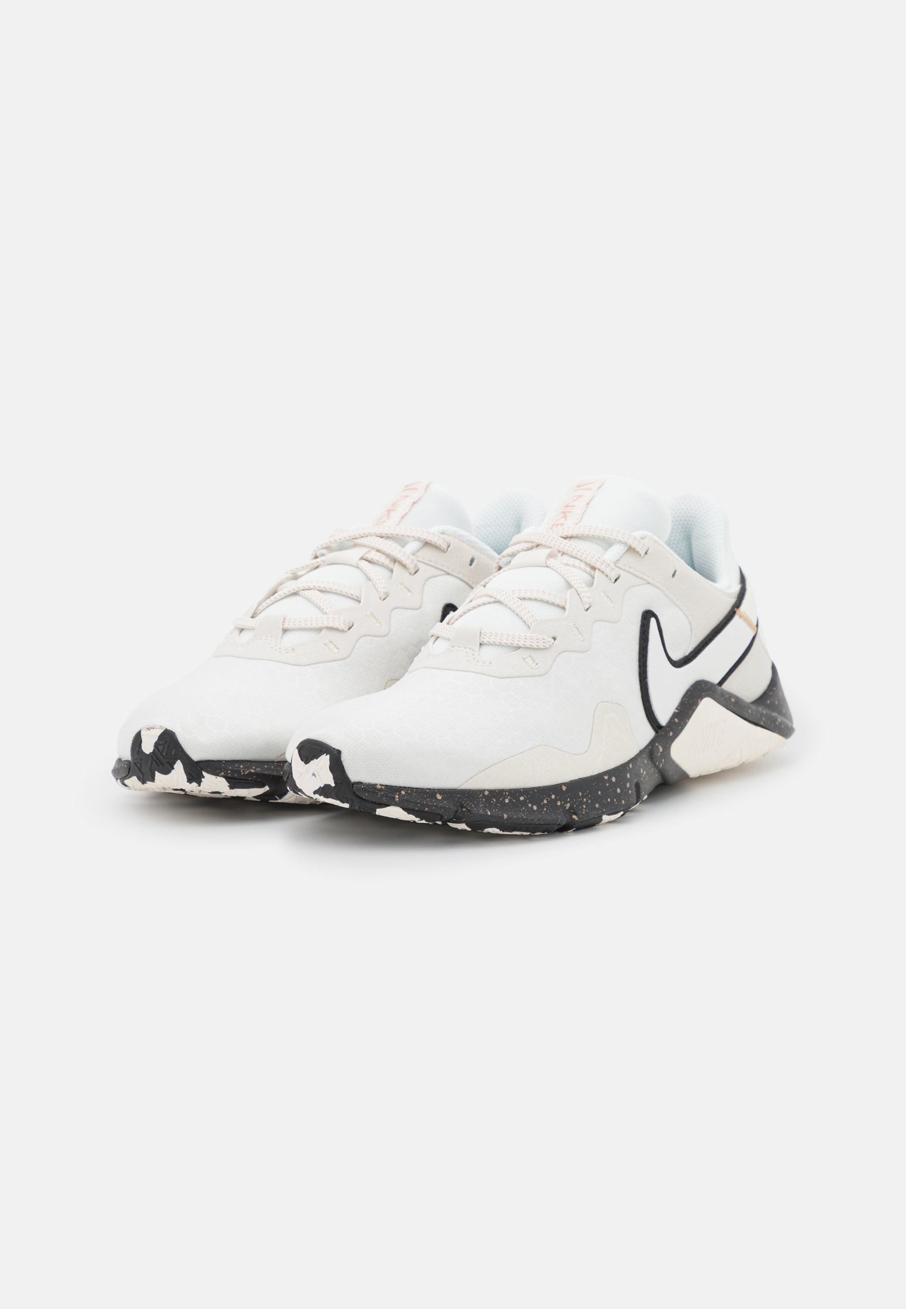 Nike Performance LEGEND ESSENTIAL 2 PRM - Training shoe -  sail/black/metallic coppercoin/off-white - Zalando.co.uk