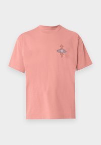 Pink cotton t-shirt with a crew neck. Features a small embroidered design in blue and orange on the chest. Short sleeves and relaxed fit.