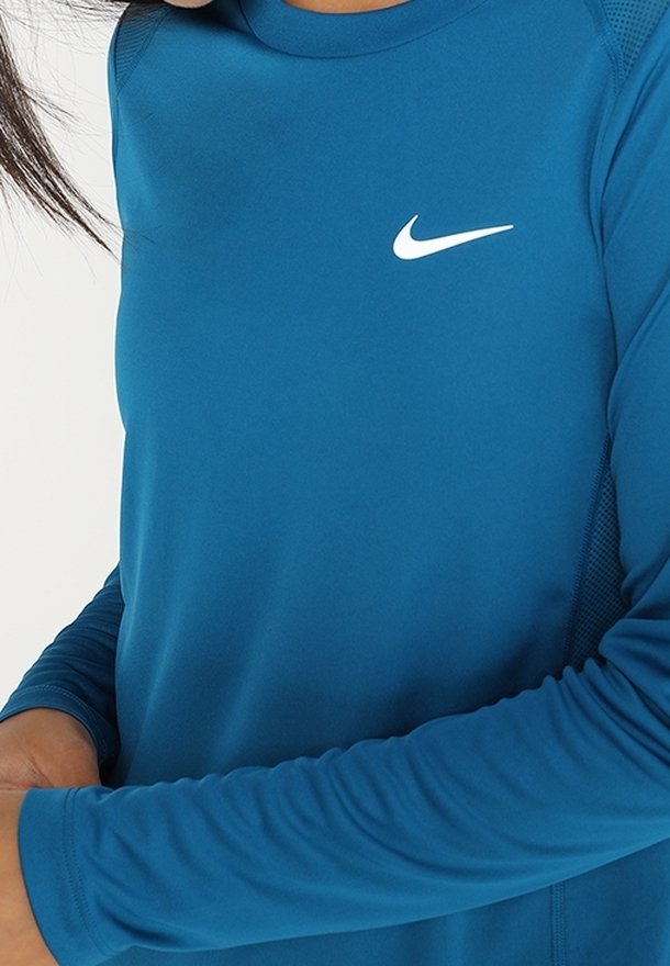turquoise nike shirt womens