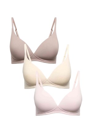 Tre reggiseni senza ferretto, leggermente imbottiti in beige, crema e rosa chiaro, disposti verticalmente su sfondo bianco.