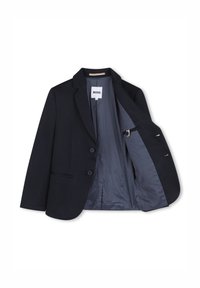 Blazer bleu marine avec deux boutons devant, une poche poitrine unique et une texture subtile. L'intérieur présente une doublure à motifs et une coupe ajustée.