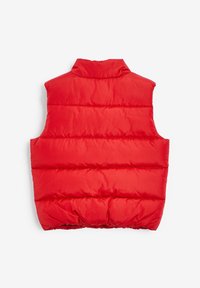 Röd pufferväst med hög krage, quiltat mönster och elastisk nederkant. Tillverkad av glänsande, slätt material med jämna sömmar.