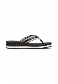 Black platform flip-flop sandal with white stripe and “TOMMY” text on fabric strap, rubber sole, and cushioned footbed.