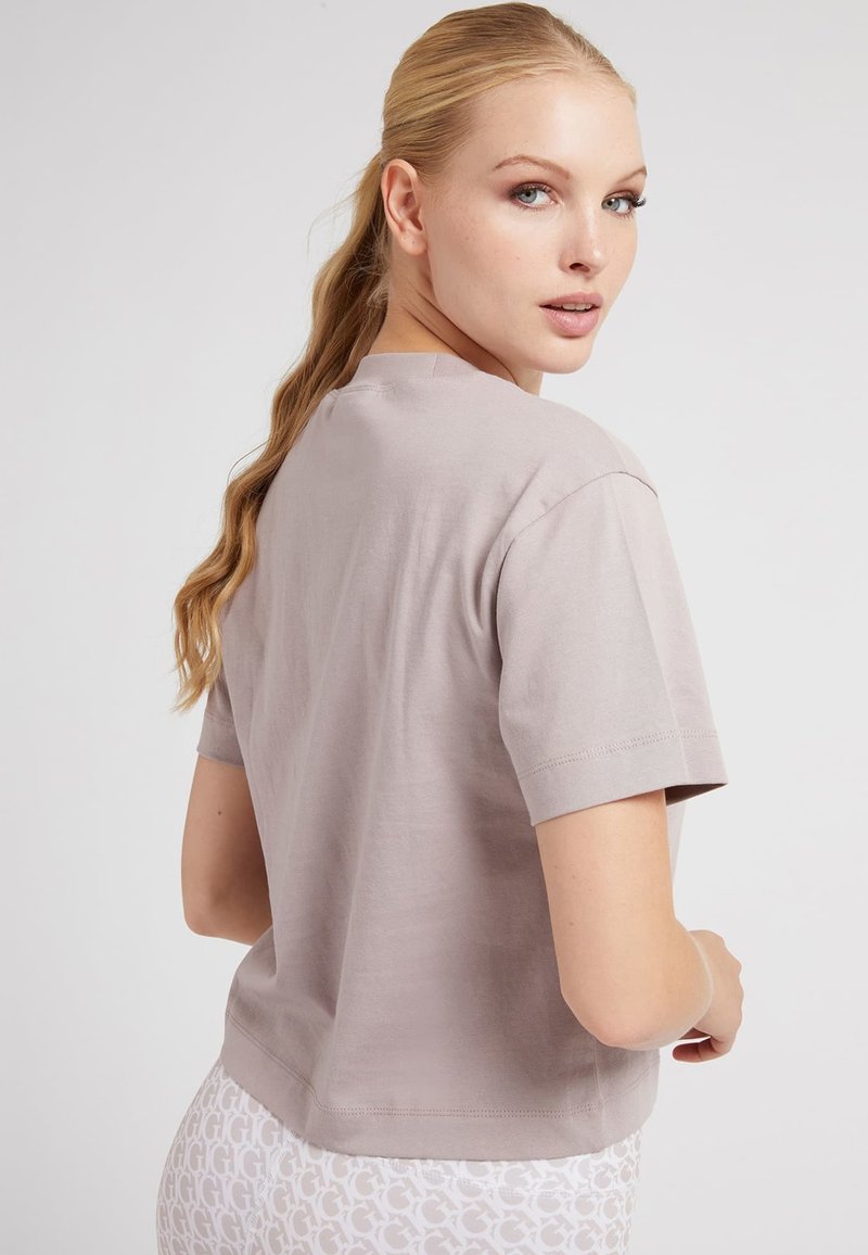 Damen Sportbekleidung | Guess LOGO VORNE T-Shirt print beige - DK58494 Damen Sportbekleidung | Guess LOGO VORNE T-Shirt print beige - DK58494