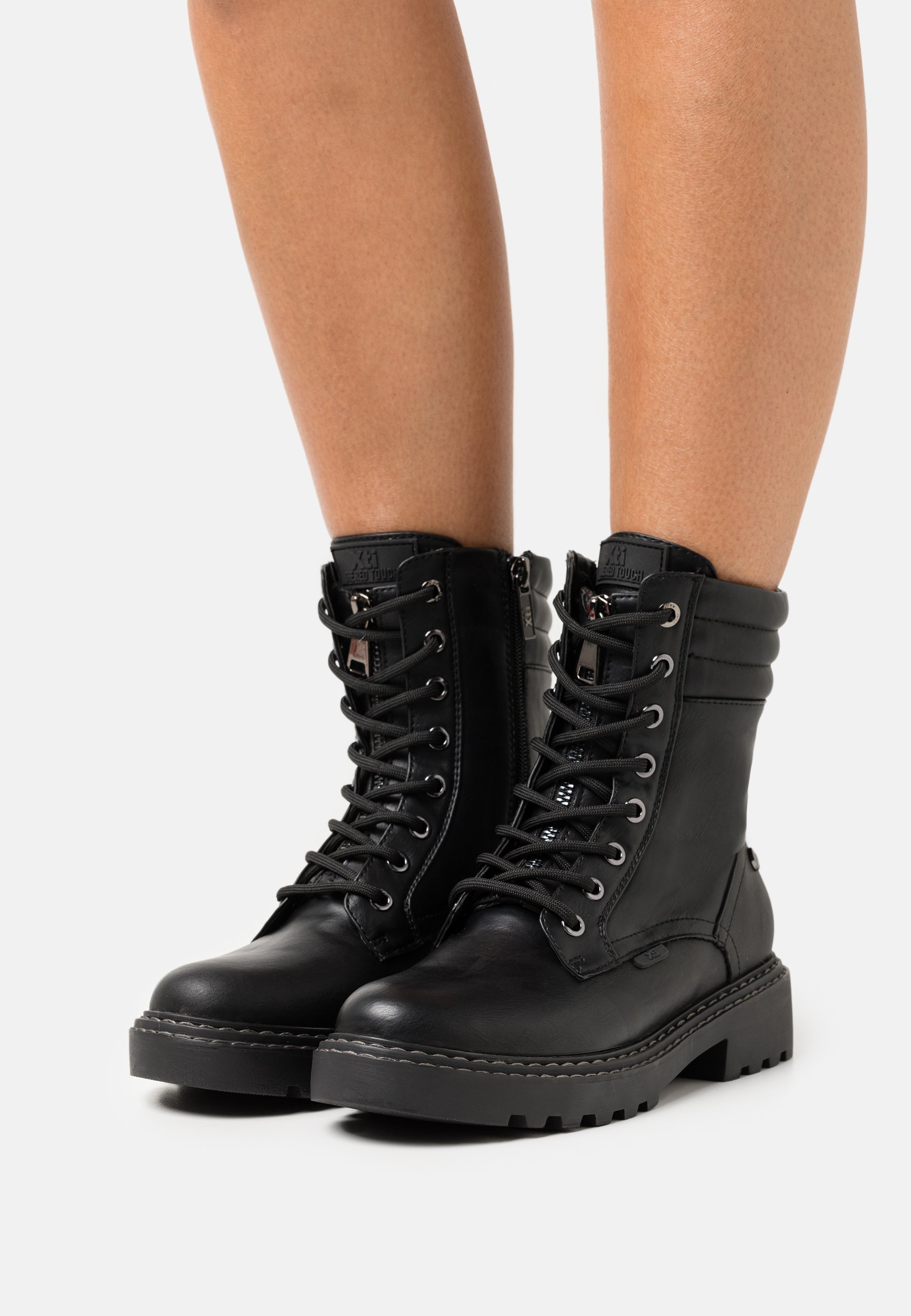 xti black ankle boots